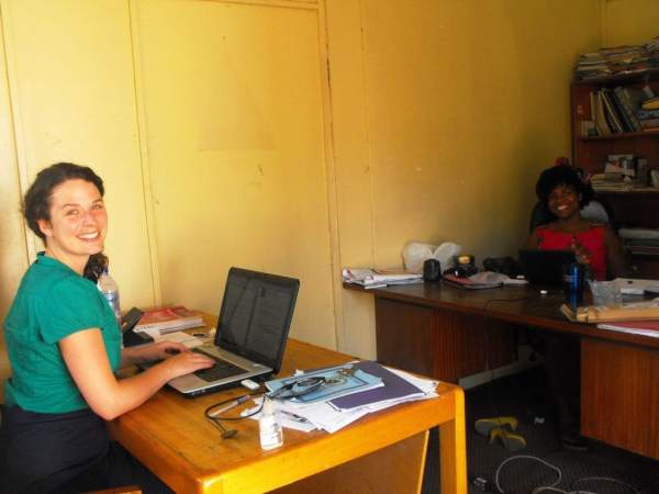 Interns Nora (left) and Camaro start their workday.